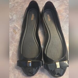 Melissa Black Jelly Ballet Flats with Bow and Gold Accent
